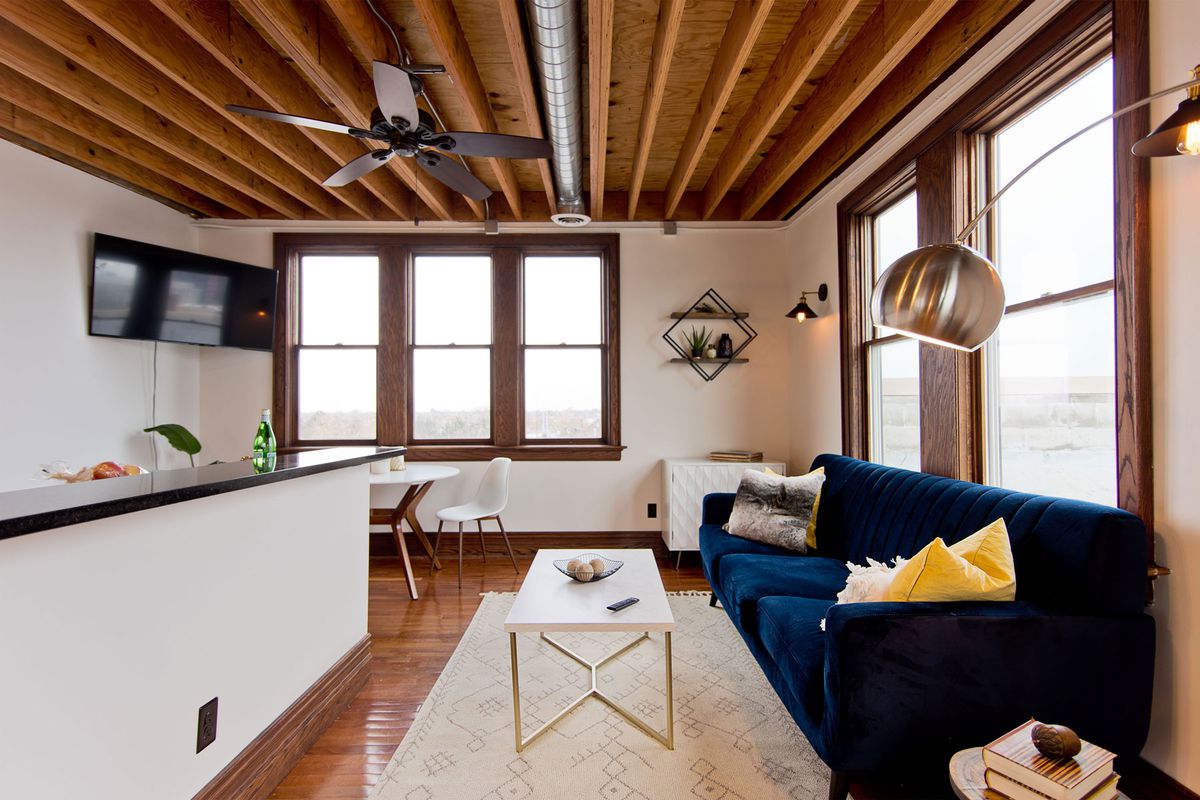Apartment with wood beams in ceiling