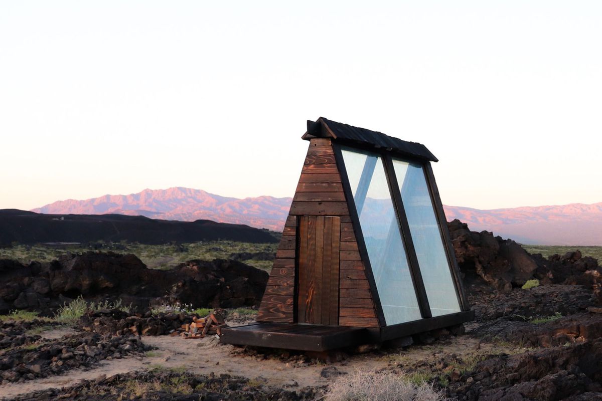 Volcanic Off-Grid Log Cabin Airbnb in Newberry Springs, California