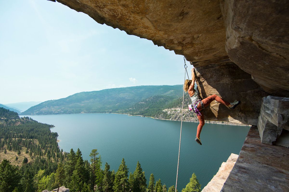 woman rock climbing in Whitefish, Montana