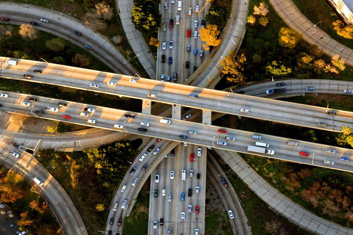 Helicopter Aerial View of the famous Los Angeles Four Level freeway interchange