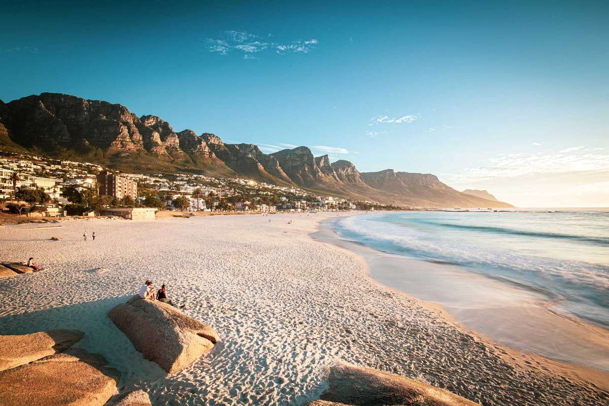 View across Camps Bay and the Twelve Apostles (Table Mountain) at sunset.