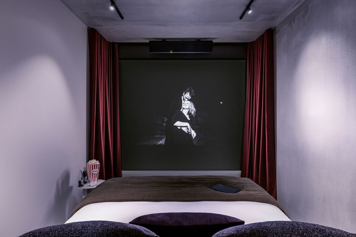 Hotel Paradiso cinema screening room with bed