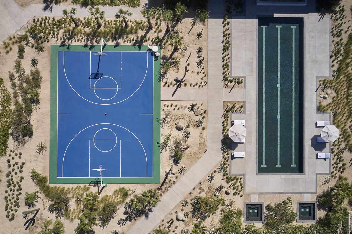 Aerial of pool and basketball court