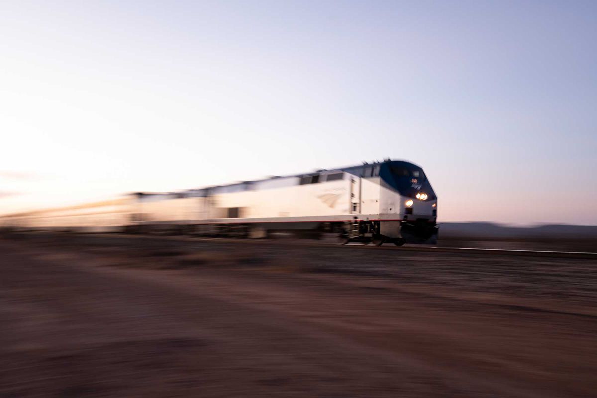An Amtrak passenger train speeds by near Valentine, Texas on Saturday, April 10, 2021.