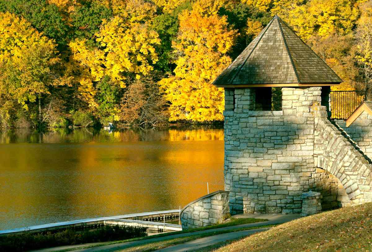 Boathouse and fisherman at Backbone State Park in Iowa
