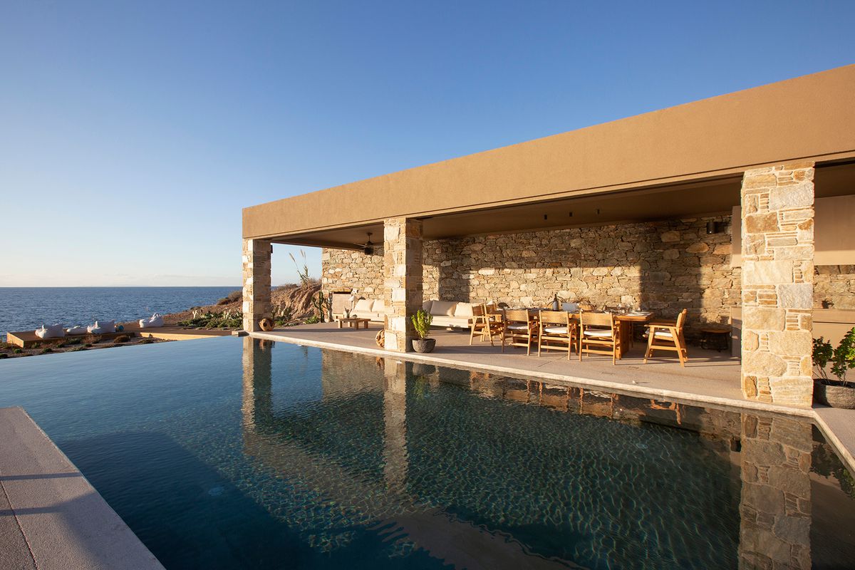 A pool at Villa Fanya a part of White Key Villas, in Syros