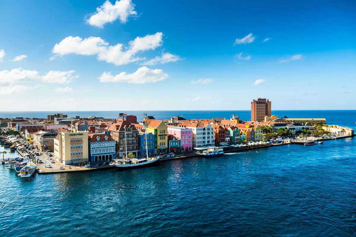 Curacao, Willemstad, Punda, colorful houses at waterfront promenade