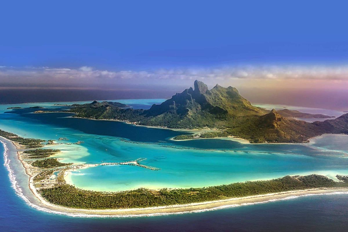 View of Bora Bora island from airplane window during landing
