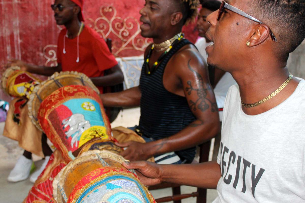 Men drumming in Havana