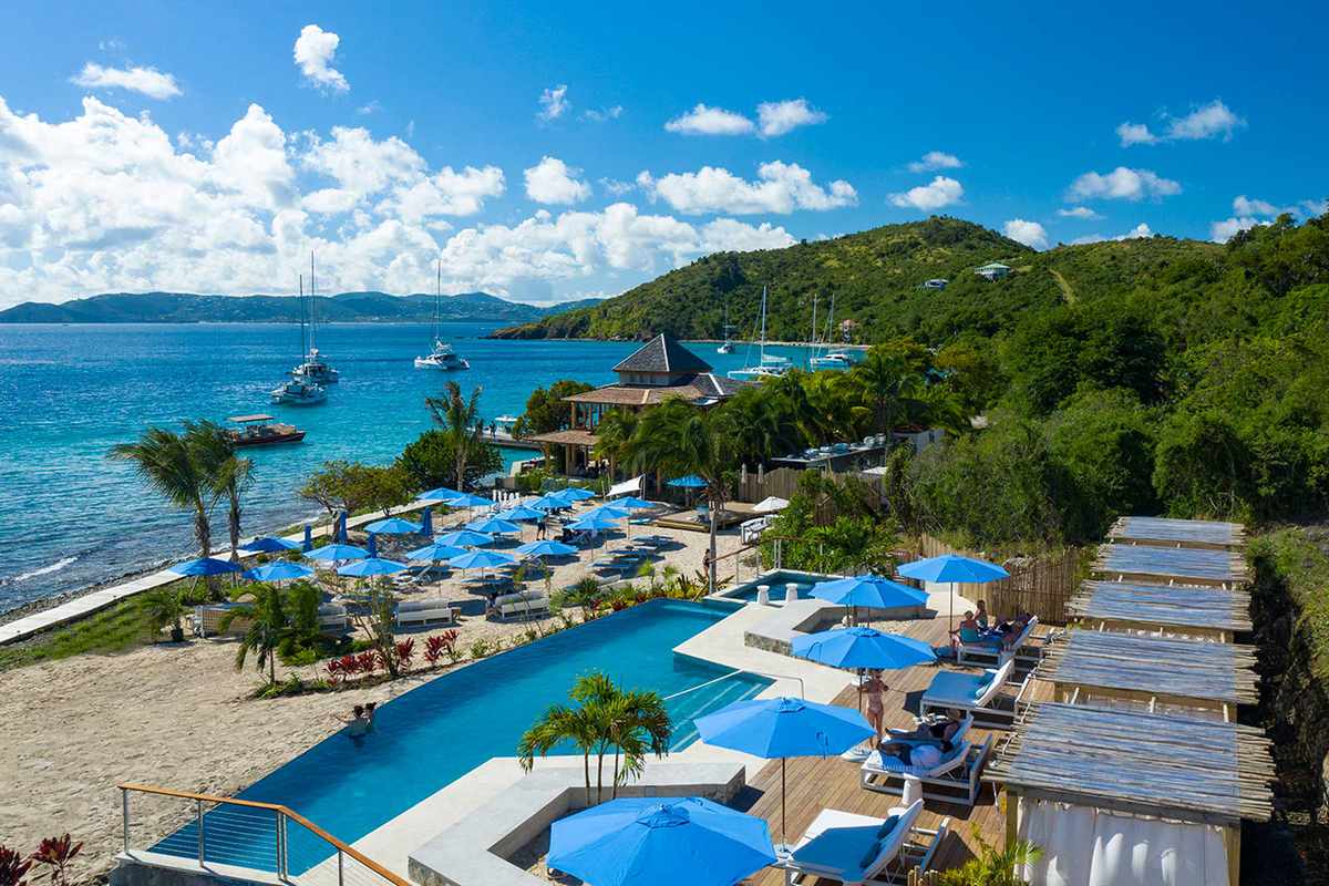 Beach and pool with cabanas at Lovango Resort & Beach Club in U.S. Virgin Islands