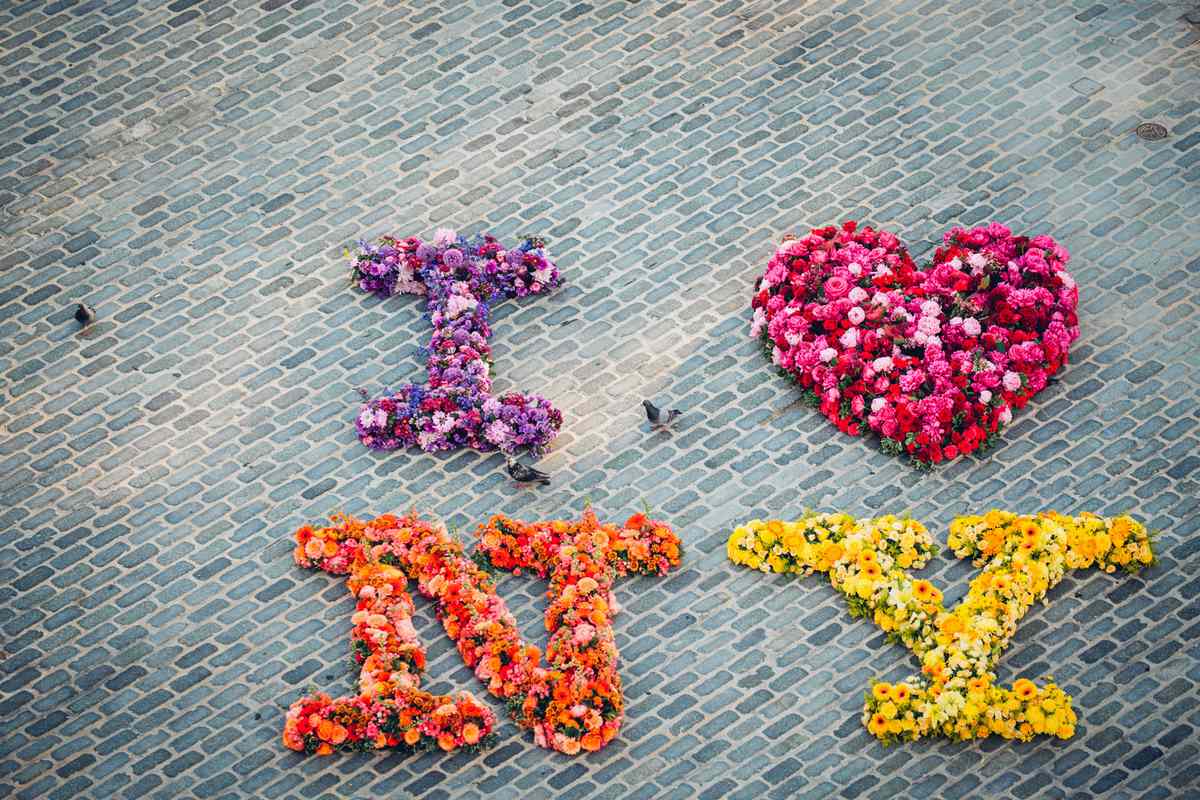 Flower arrangements spelling out I HEART NY