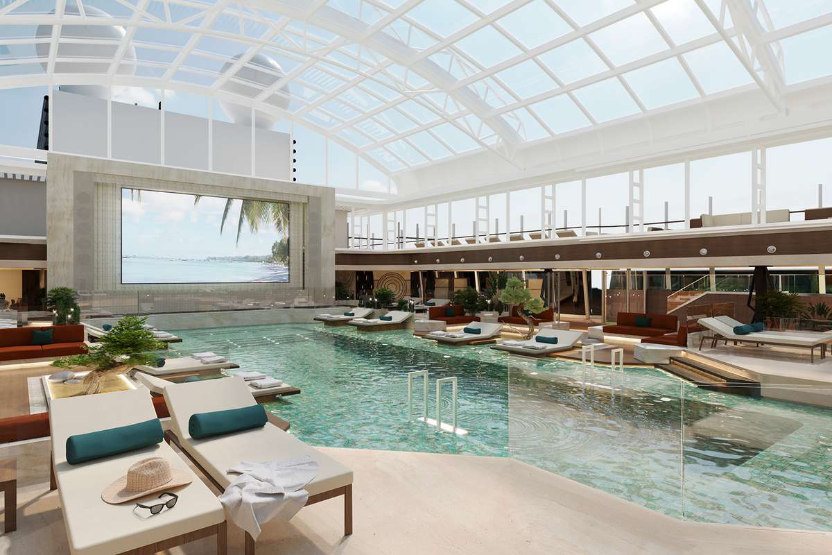 An indoor pool on board the Explora Journeys cruise ship