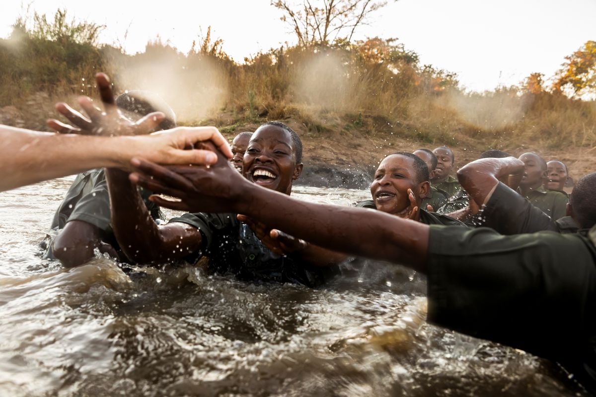 Female African park rangers in the water