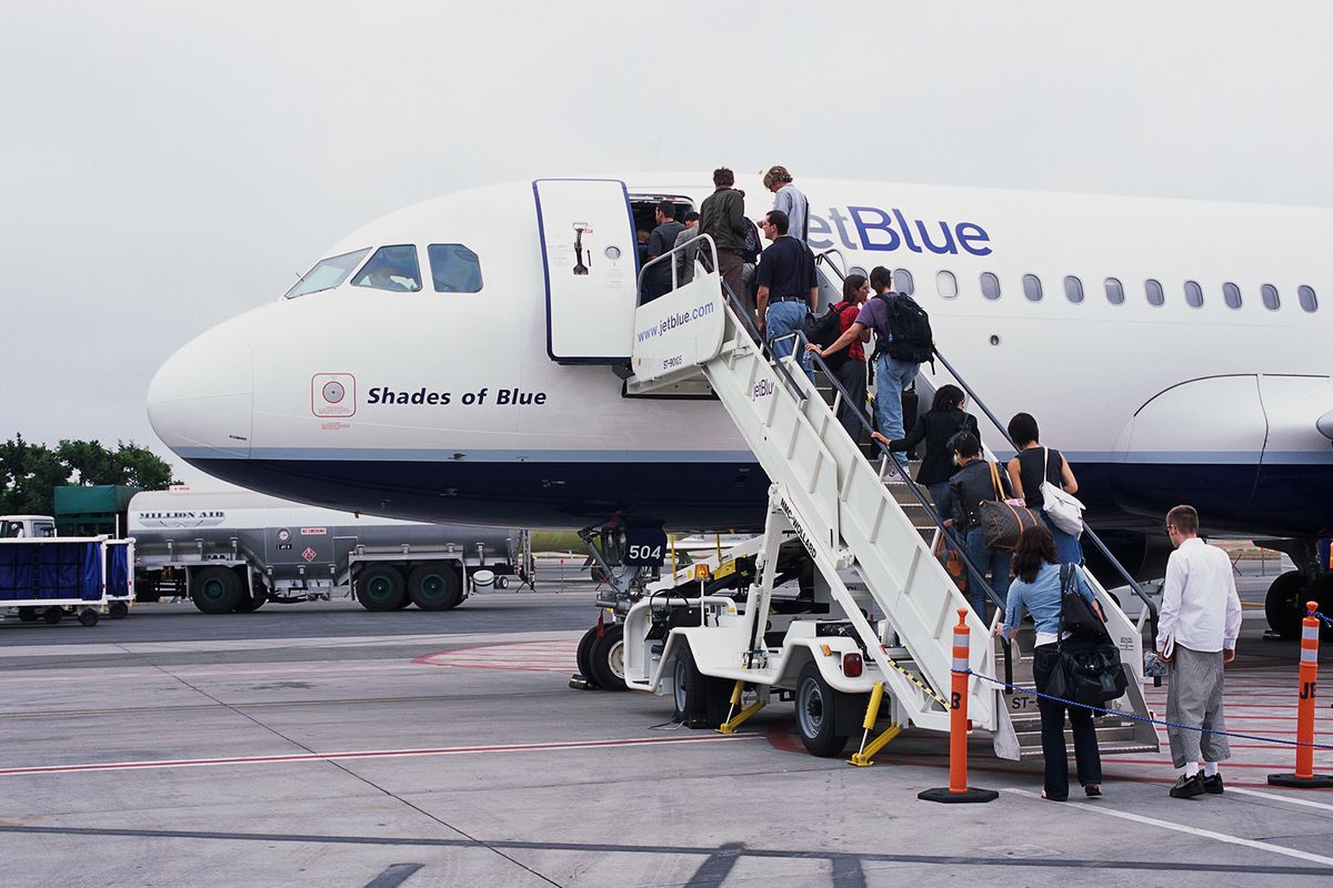 Travelers Boarding a JetBlue Flight