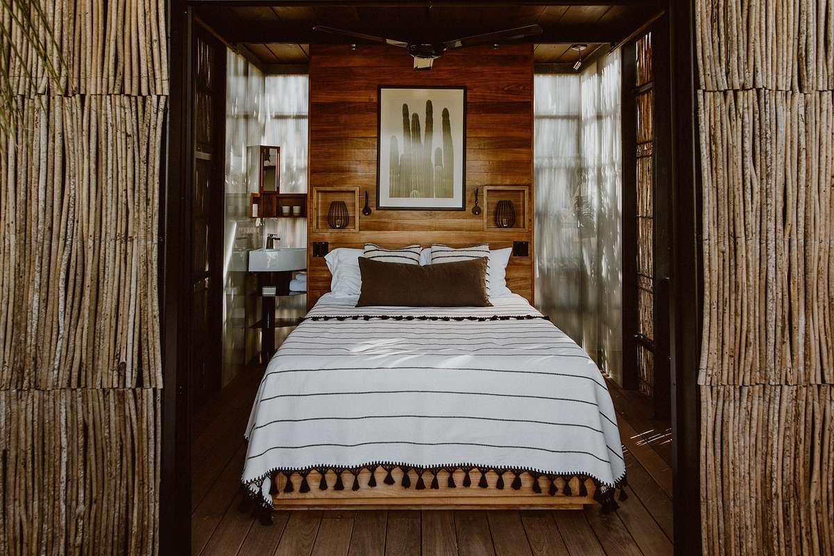 A treehouse bedroom at Acre Baja