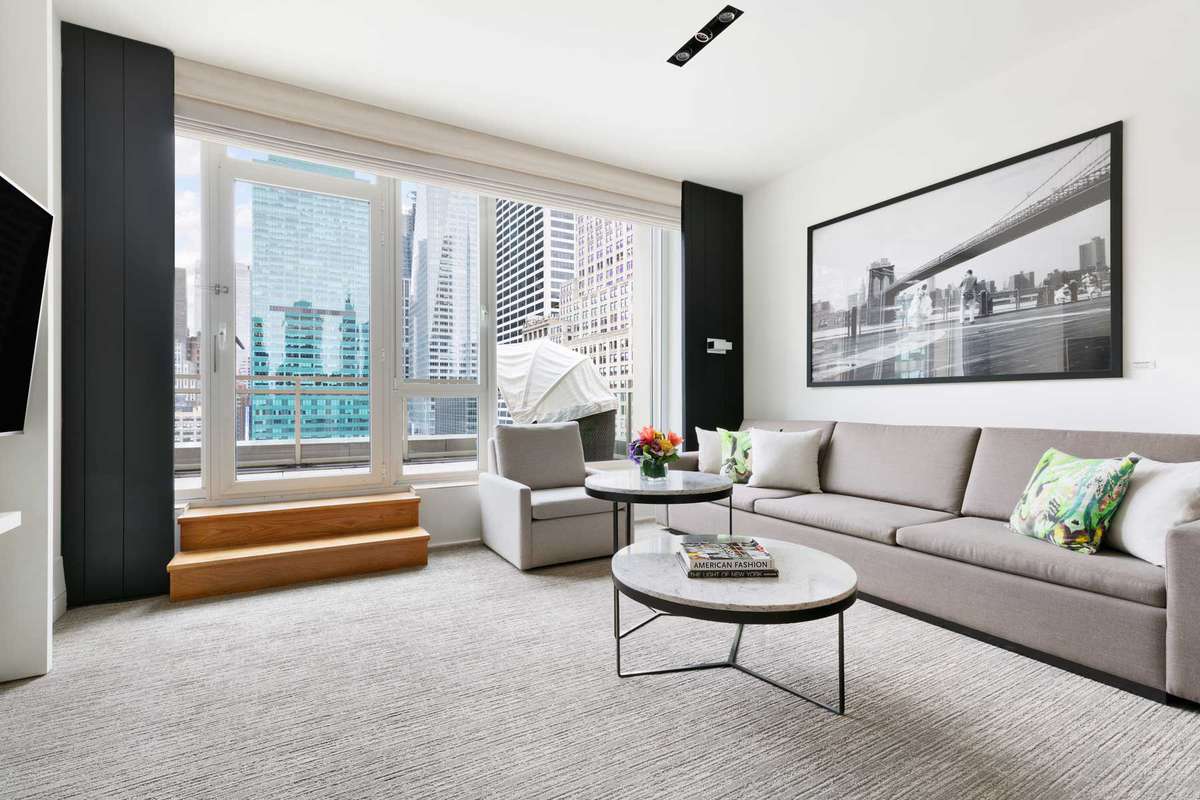 A guest suite with city views at the Andaz 5th Avenue, voted one of the top hotels in New York City
