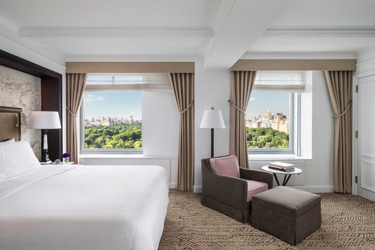 Guest room with a view of Central Park at the Ritz-Carlton New York Central Park, voted one of the top hotels in New York City