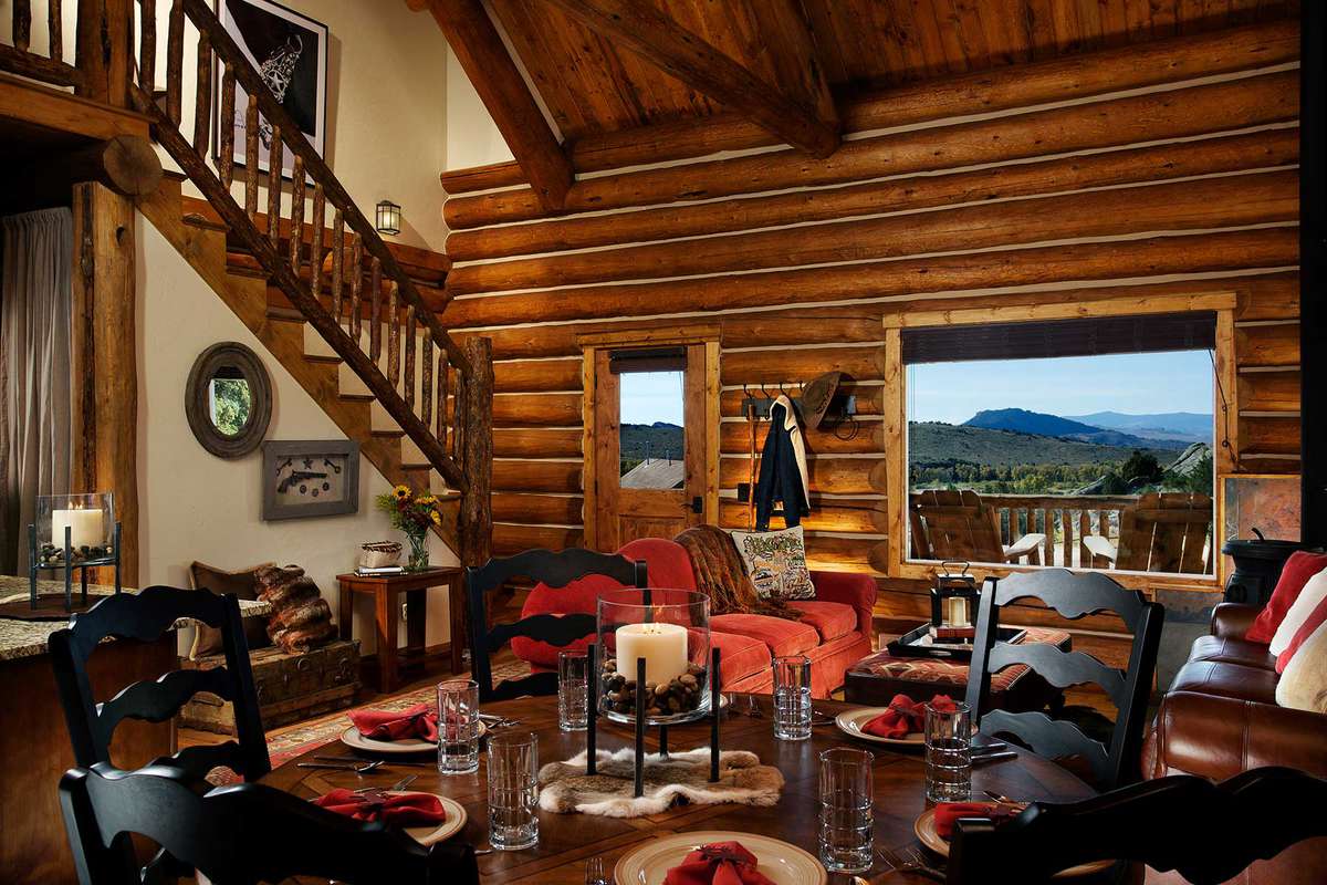 The dining area of a cabin at The Lodge & Spa at Brush Creek Ranch, voted one of the best hotels in the world