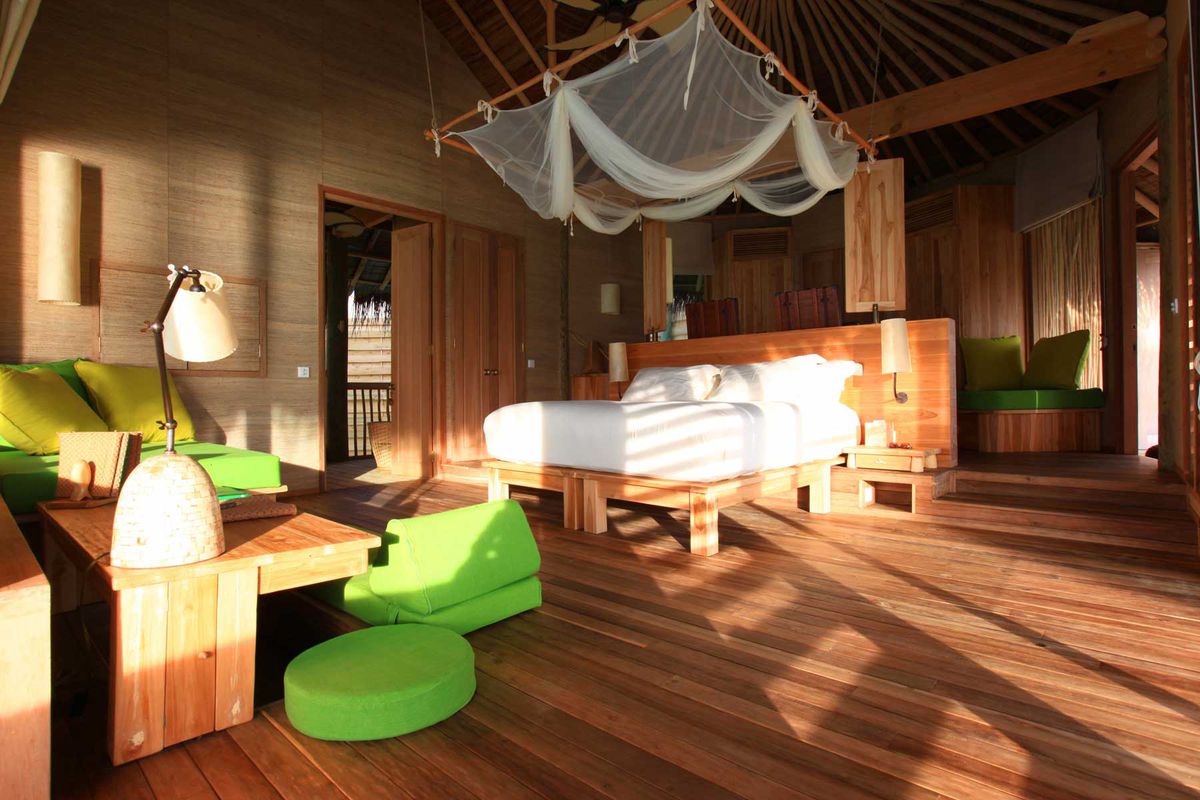 A light filled guest room at the Six Senses Laamu, voted one of the best hotels in the world