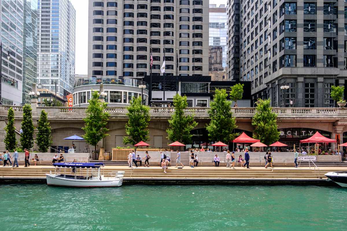 Chicago River with The River walk and surrounding downtown architecture in summer, Chicago, Illinois
