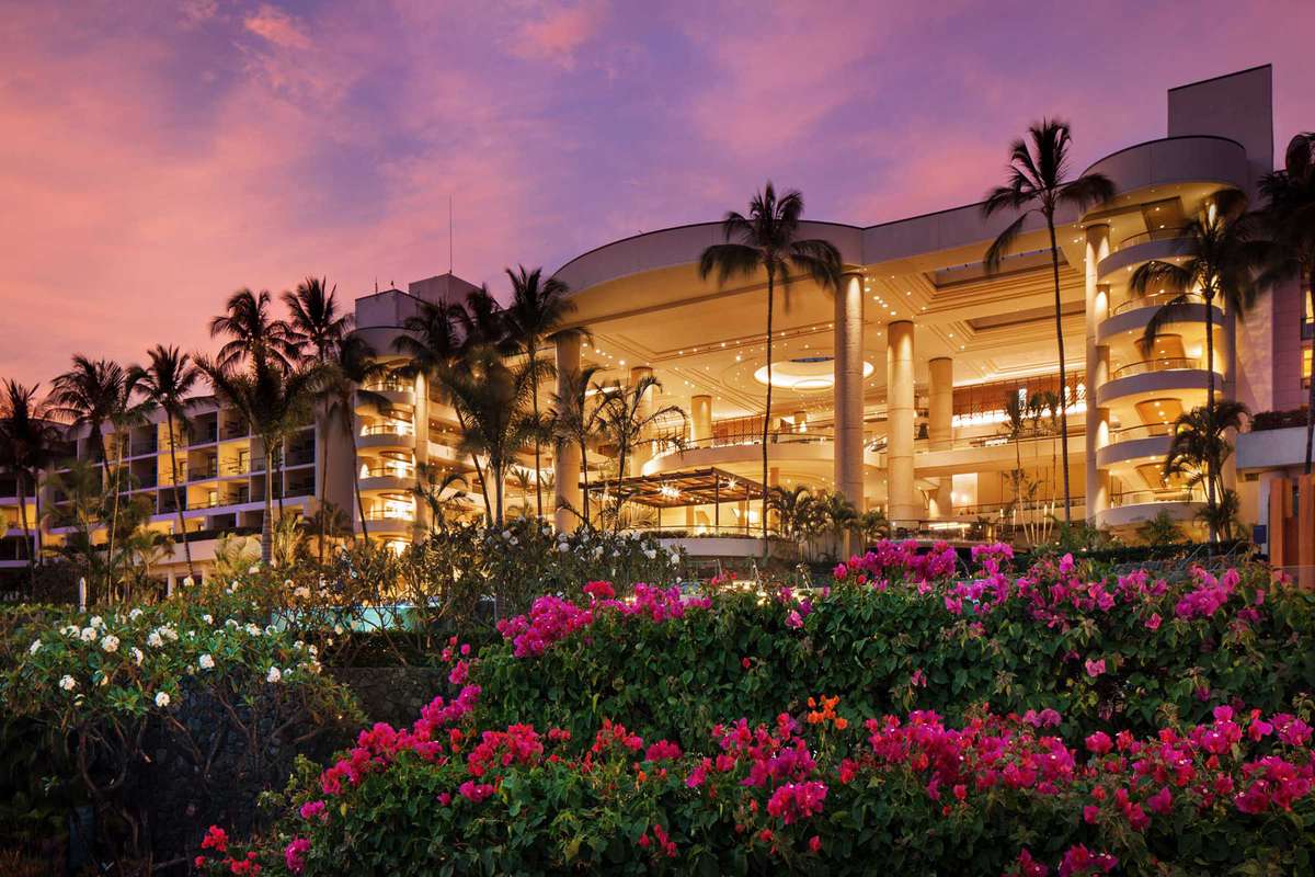 Nighttime exterior view of the Westin Hapuna Beach hotel, voted one of the best resorts and hotels in Hawaii