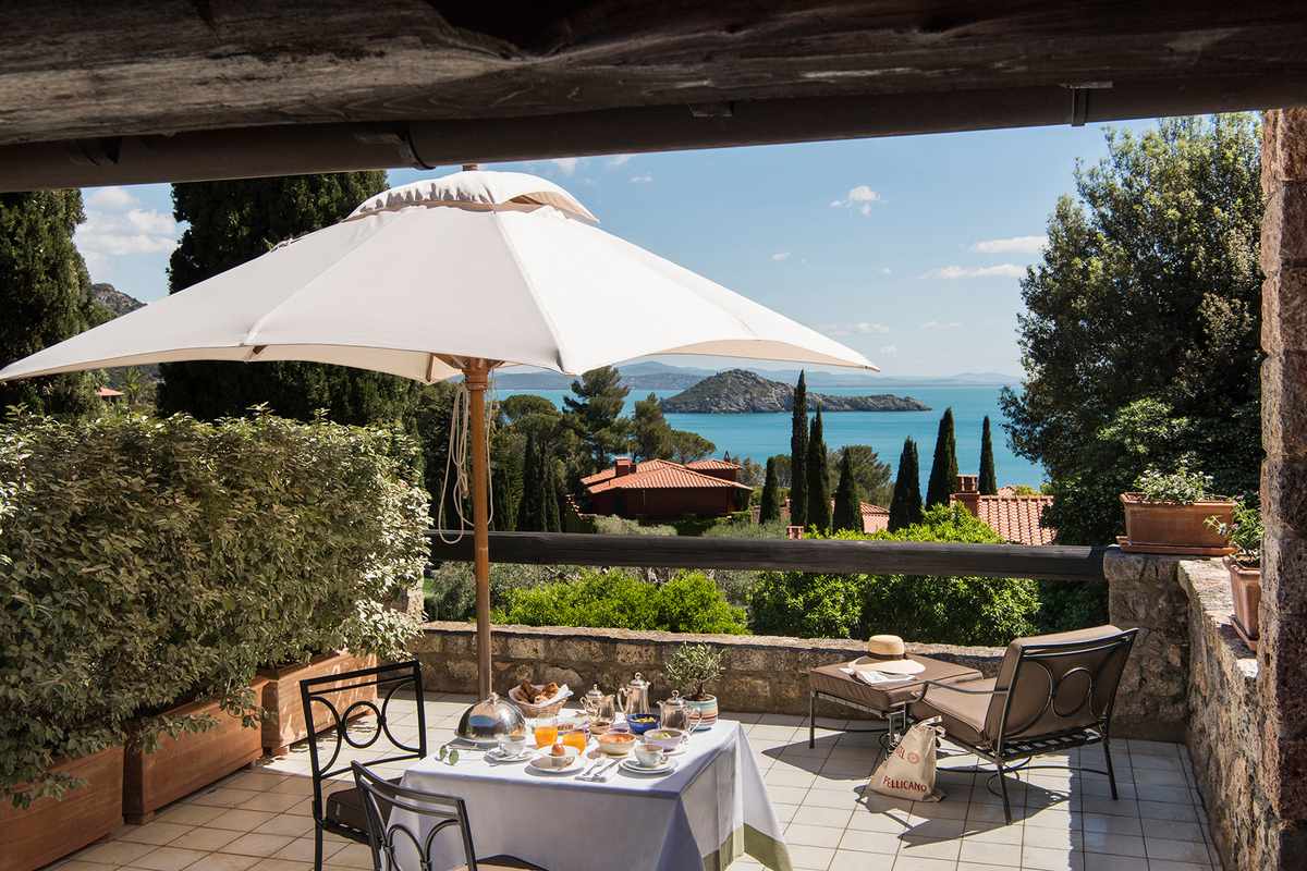 Breakfast in the the terrace of the Cormoran master bedroom at Hotel Il Pellicano in Porto Ercole