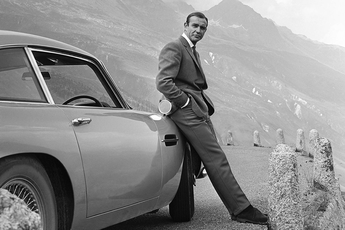 1964: Actor Sean Connery poses as James Bond next to his Aston Martin DB5 in a scene from the United Artists release 'Goldfinger' in 1964.