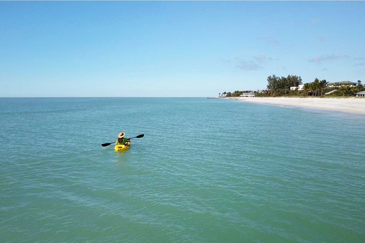 A kayaker off the coast of Longboat Key, Florida