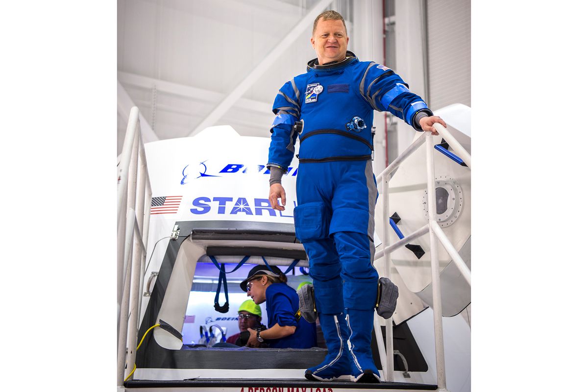 NASA astronaut Eric Boe wears Boeing's new spacesuit designed to be worn by astronauts flying on the CST-100 Starliner.
