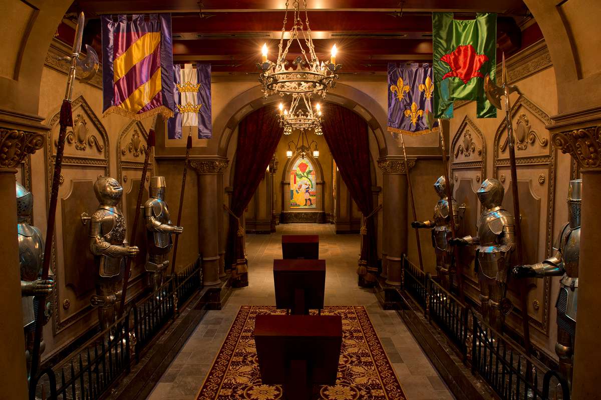 Flanked with suits of armor, this mysterious hallway leads Magic Kingdom guests into Beast's Castle for quick-service lunch cuisine at Be Our Guest Restaurant.