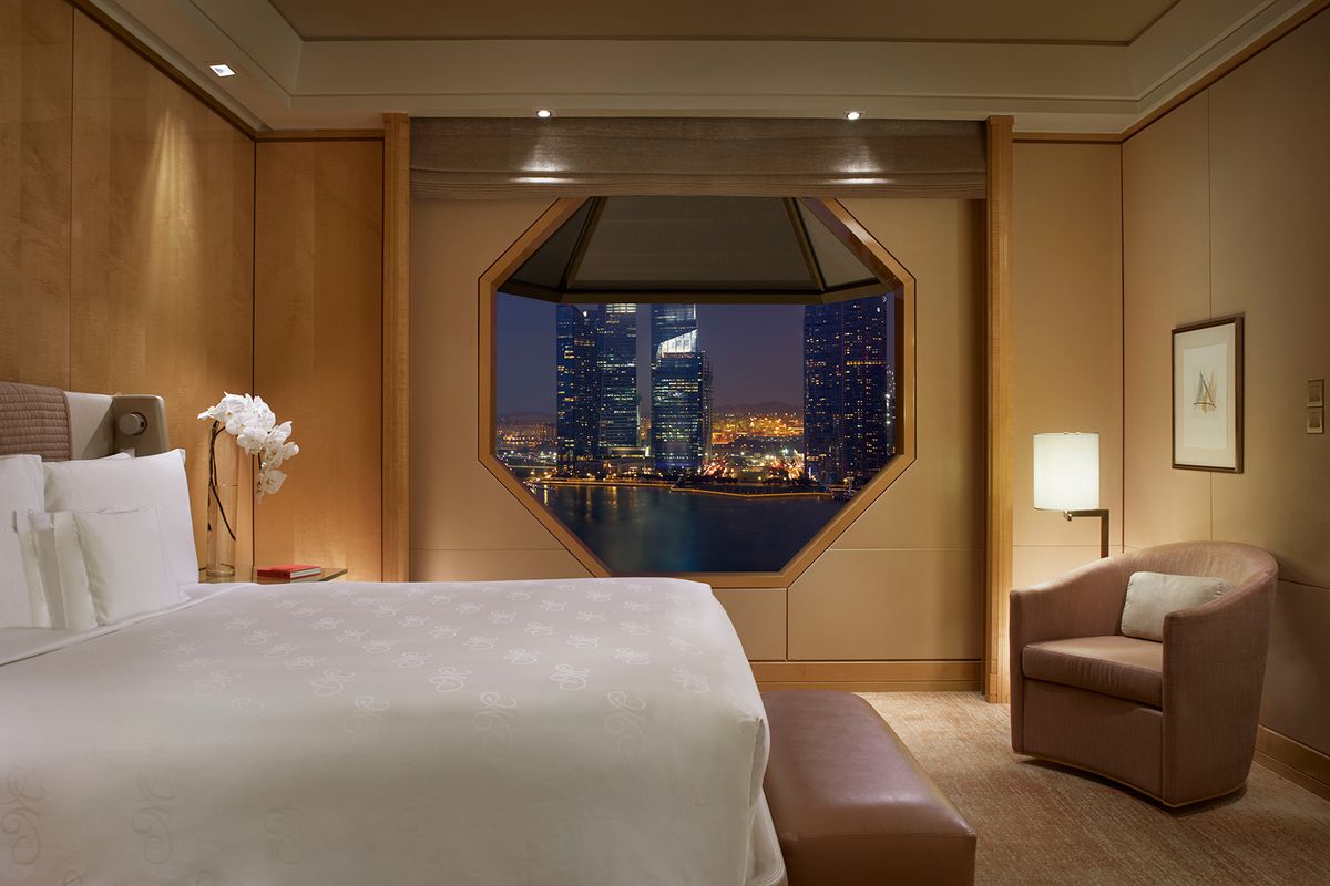 Premier Suite - King bedroom at The Ritz-Carlton, Millenia Singapore