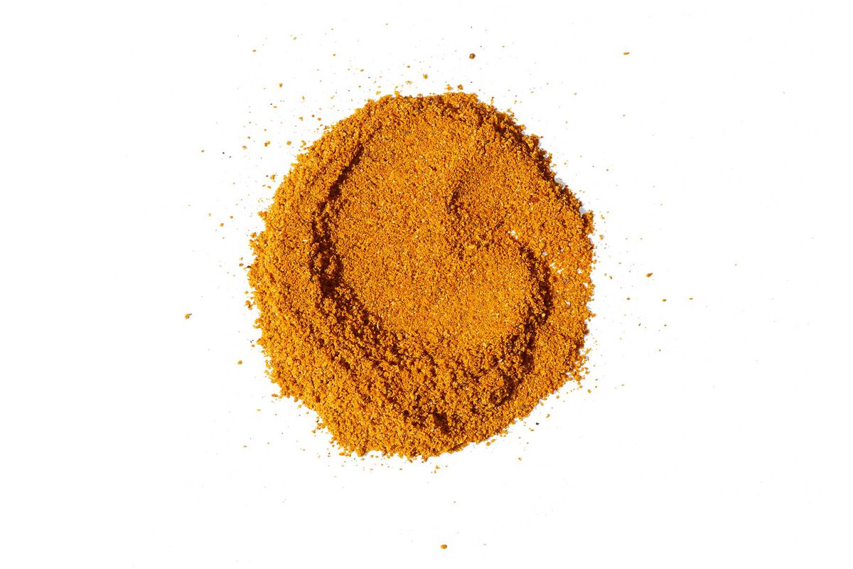 A pile of Mekko Spice Rub from Essie Spice, photographed on white background