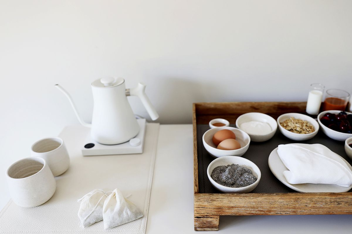 Shou Sugi Ban Inn's room breakfast tray with tea brewing