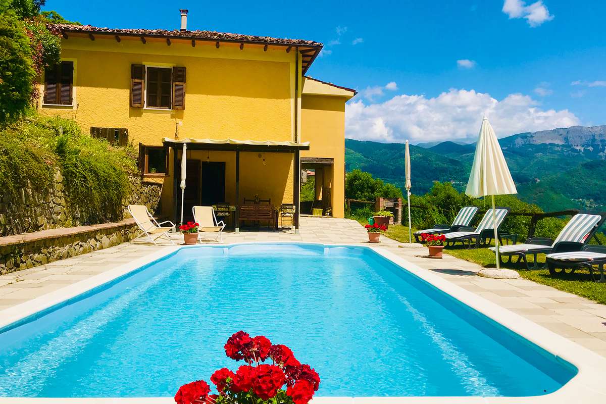 The exterior of the villa and pool at the Northern Tuscan villa