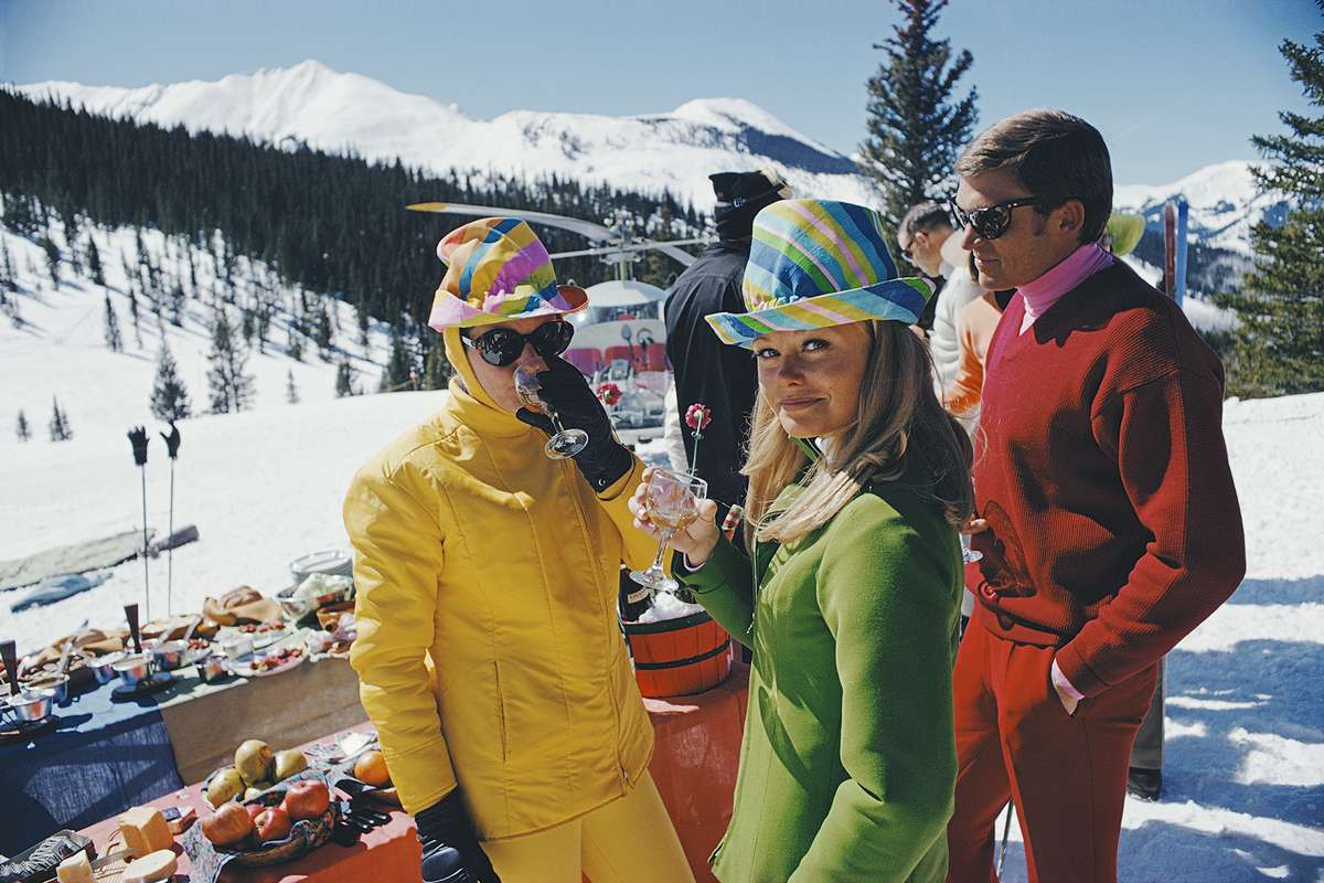 Women in colourful hats at an apres ski party in Snowmass Village, in Pitkin County, Colorado, in March 1968.