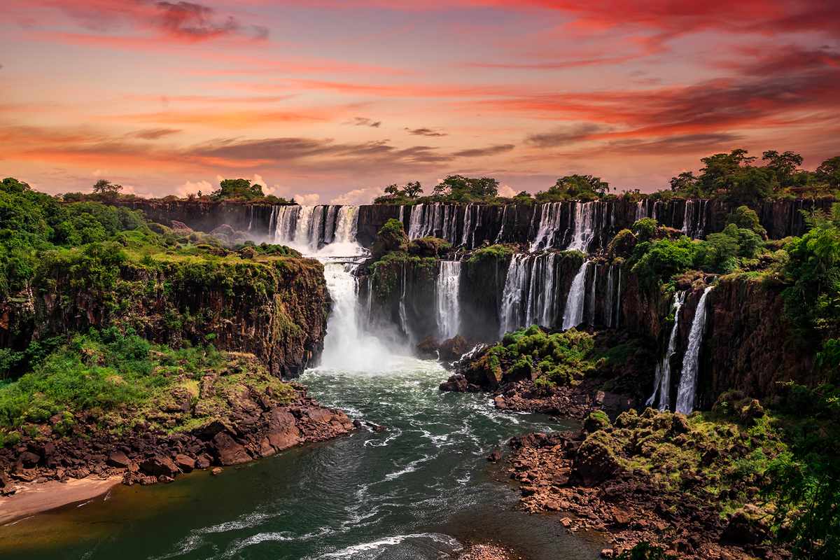 Beautiful sunset at Iguazu falls. One of the new seven wonders of nature. Traveling South America