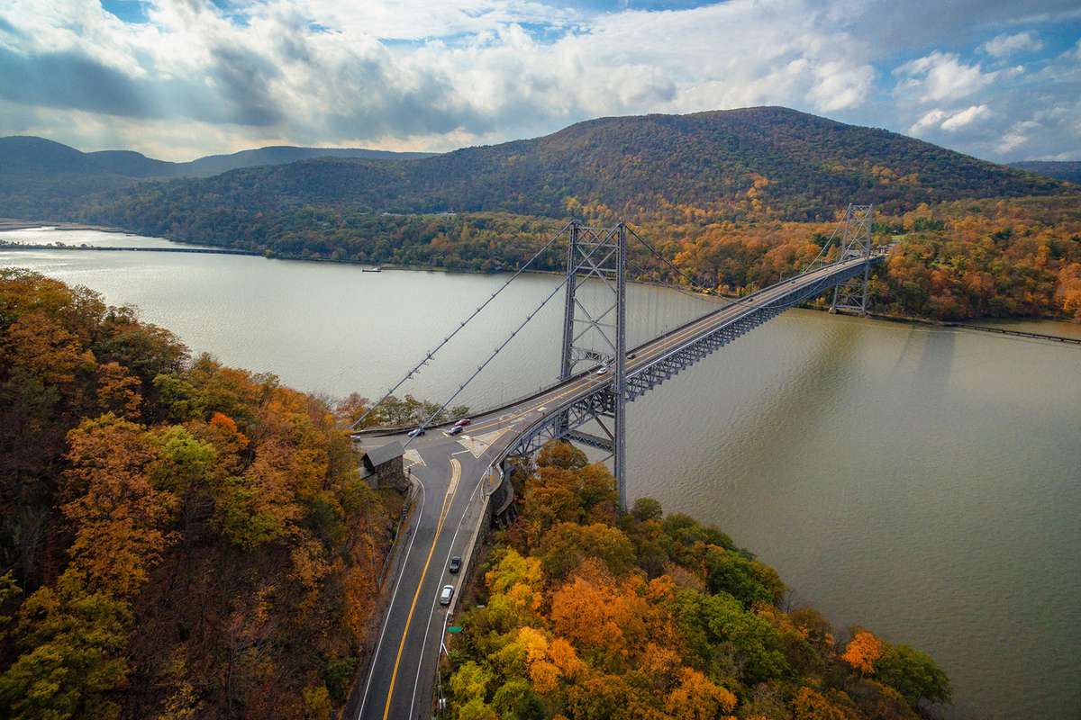 Aerial image of Bear Mountain Bridge during peak fall foliage
