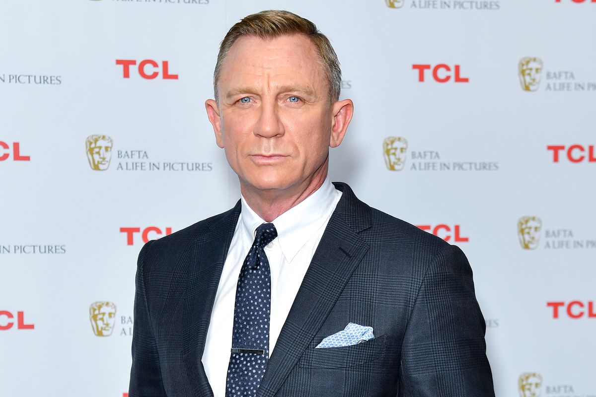 Daniel Craig poses during the "BAFTA: A Life in Pictures with Daniel Craig" supported by TCL mobile photocall at Odeon Luxe Leicester Square on September 24, 2021 in London, England.