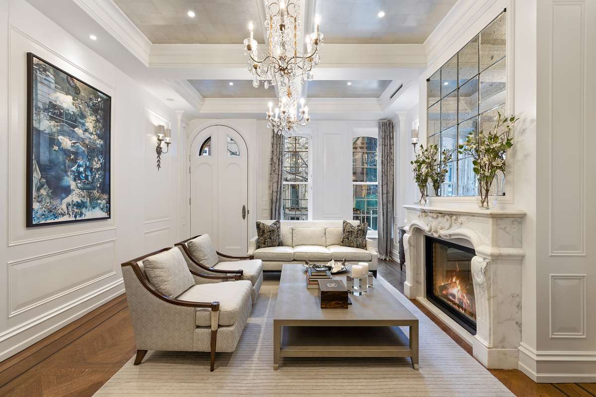 Inspirato's Breakfast at Tiffany's Brownstone's living room with fireplace