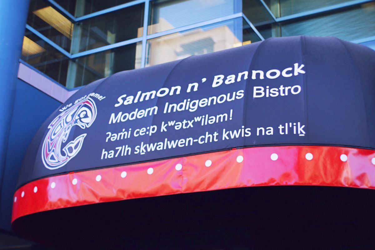 Exterior sign of Salmon n' Bannock, a modern Indigenous Bistro, in Vancouver