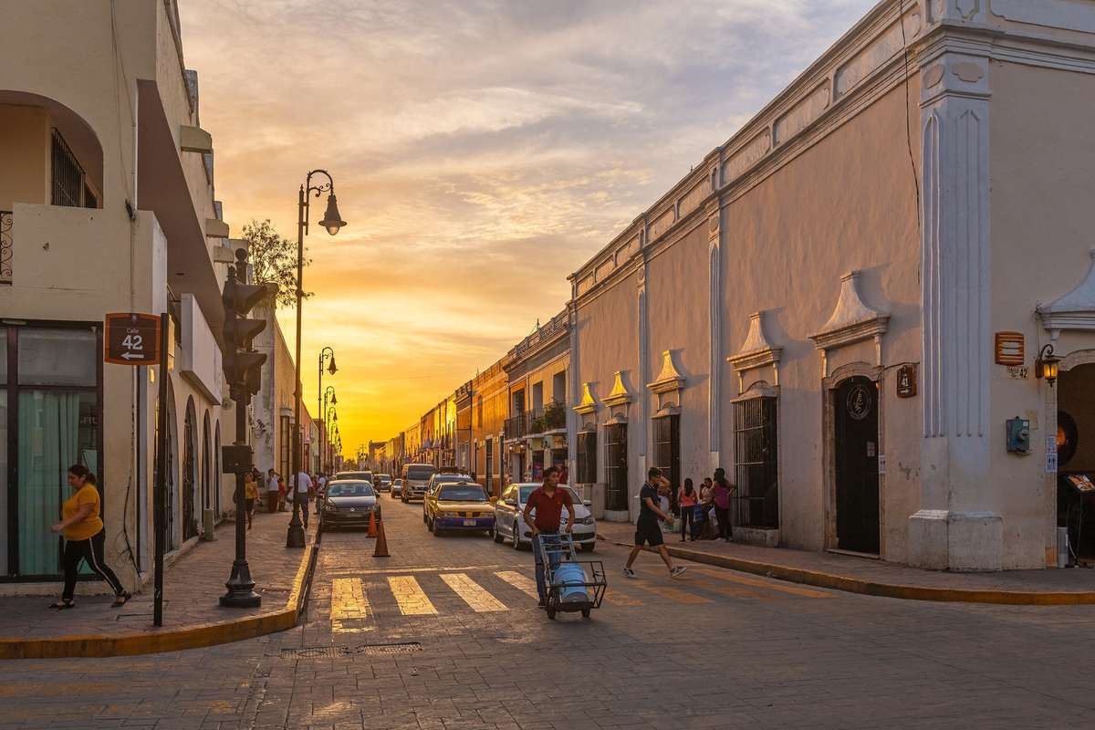 Mexican city life at sunset in a street of Valladolid in Yucatan.