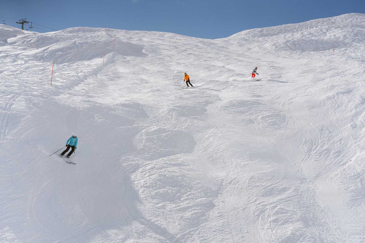 Downhill skiers in Andermatt, Switzerland