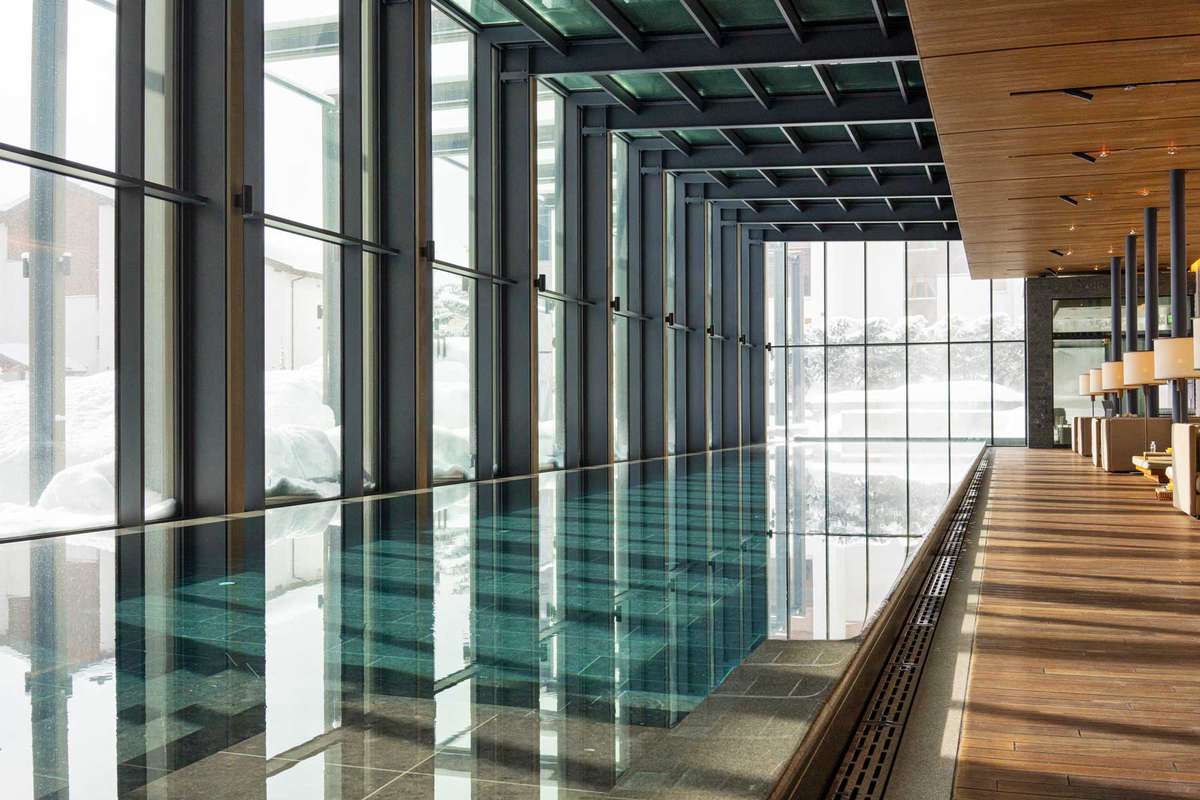 An indoor pool at a luxury hotel in Andermatt, Switzerland