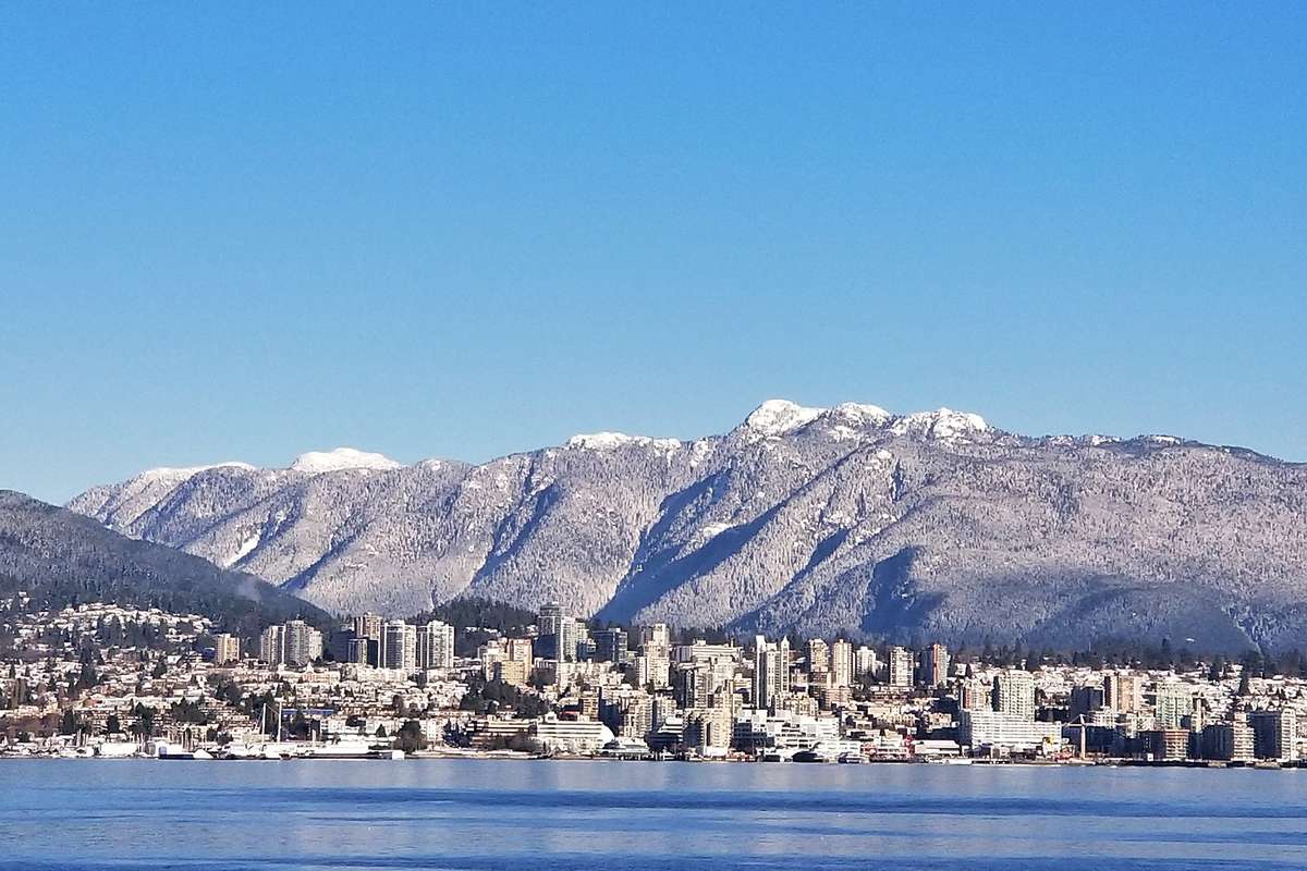 Scenic View Of Sea And Snowcapped Mountains In North Vancouver, Canada
