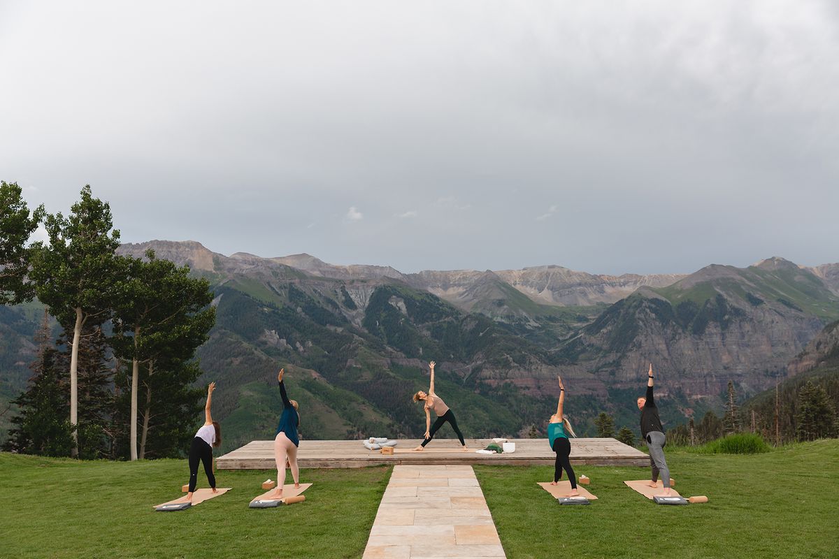 Yoga on top of a mountain at RESET Telluride