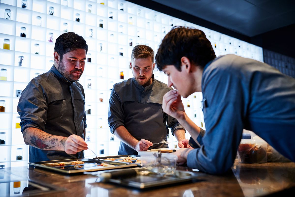 Chefs taste testing at Alchemist in Copenhagen