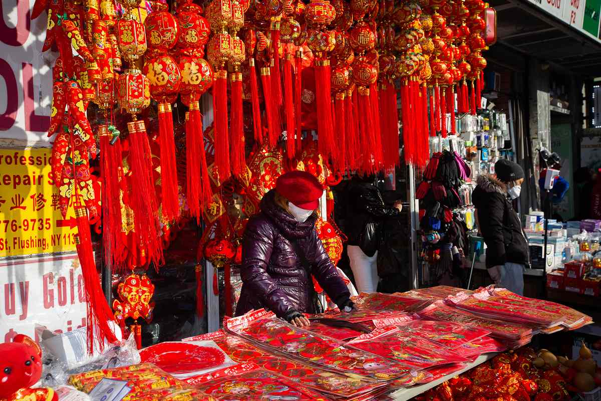 A stand selling red and gold lanterns in Flushing, Queens