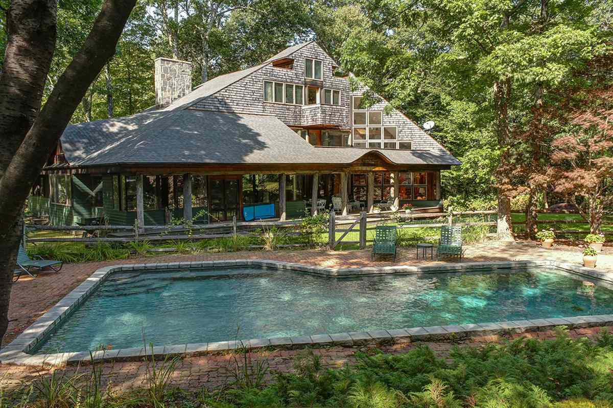 The exterior and pool at THE TREEHOUSE at 720 West Road, Richmond, Massachusetts