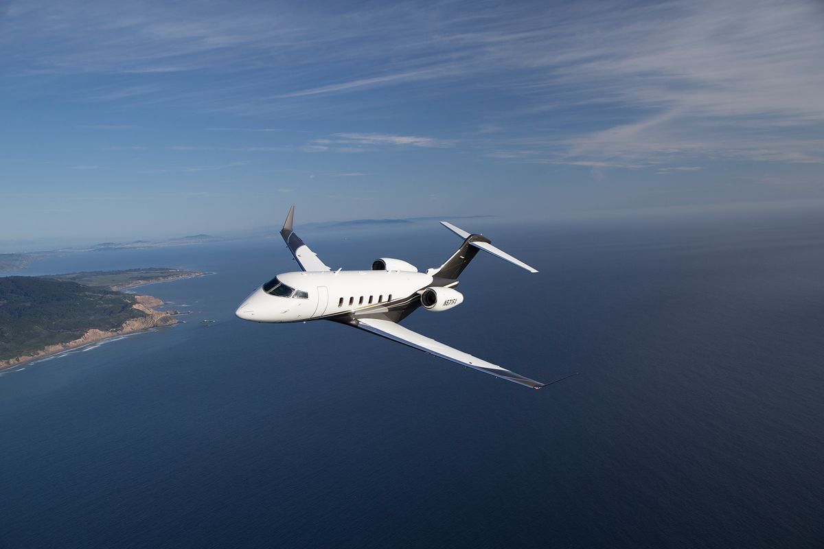A Flexjet private plane flying over ocean