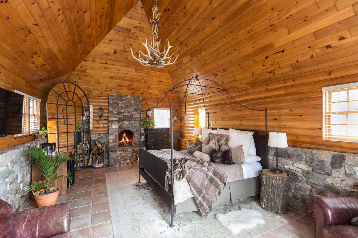 Winter getaway at Cedar Lake Estates, interiors of cozy guest rooms and exteriors of snowy landscapes and ice skating rink